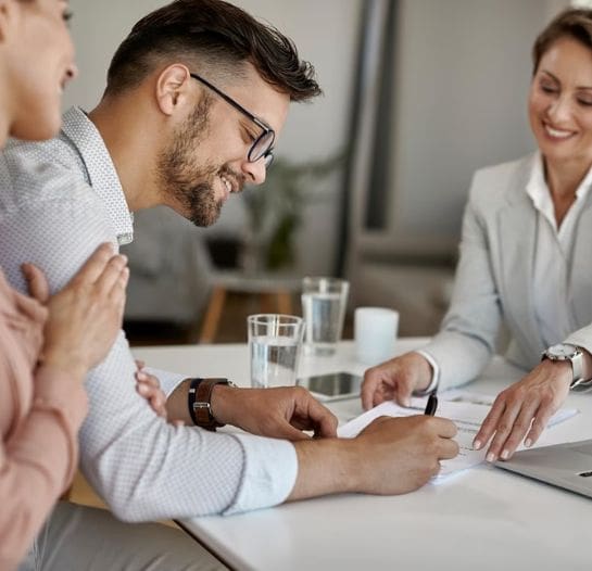 A Man Signing the Paper With Insurance Agent